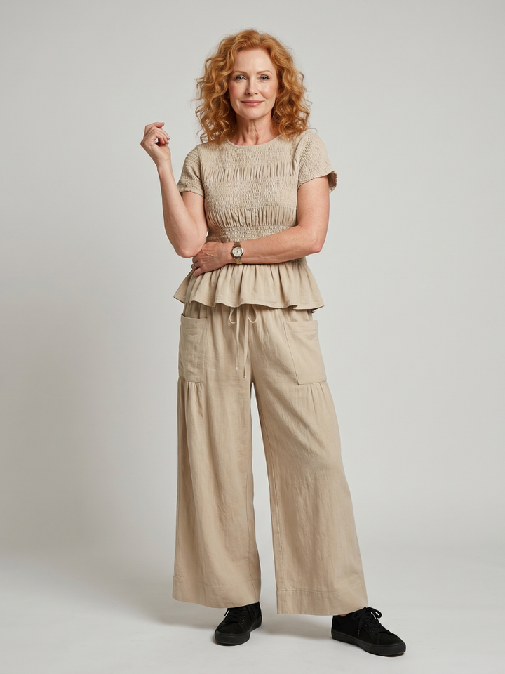 Eirenne | Peplum Detail Smocked Top And Wide Leg Pants Set 0