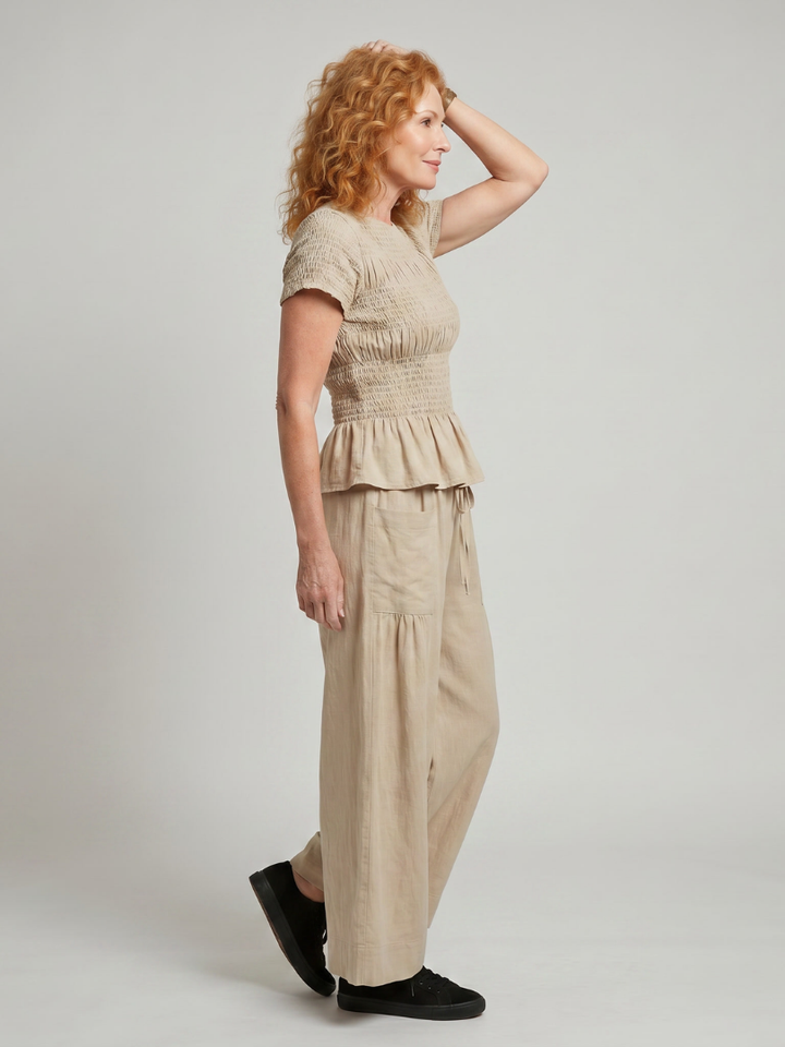 Eirenne | Peplum Detail Smocked Top And Wide Leg Pants Set 1